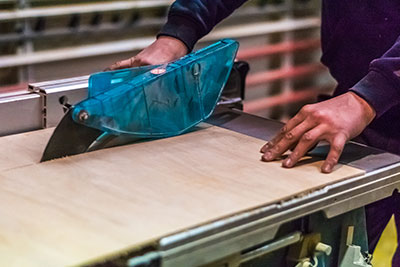 Table saw cutting wood